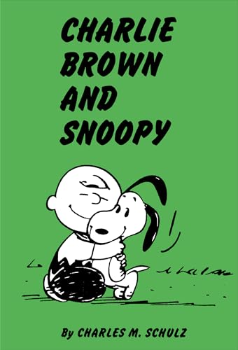 Green book cover featuring Charlie Brown embraced by Snoopy.