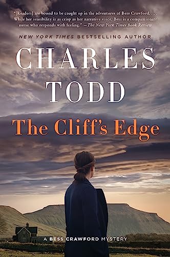 Book cover: woman looking at landscape, title "The Cliff's Edge" by Charles Todd.