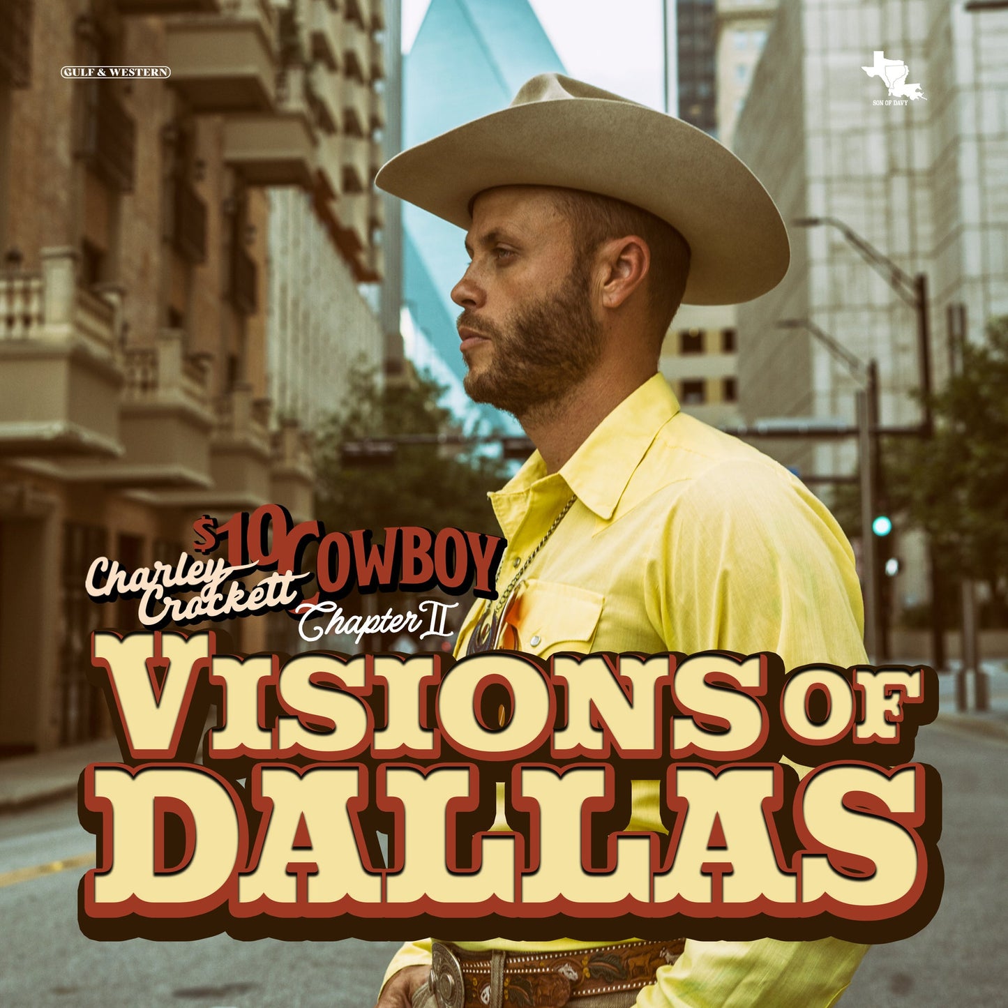 Charley Crockett wearing a cowboy hat and yellow shirt on a city street.