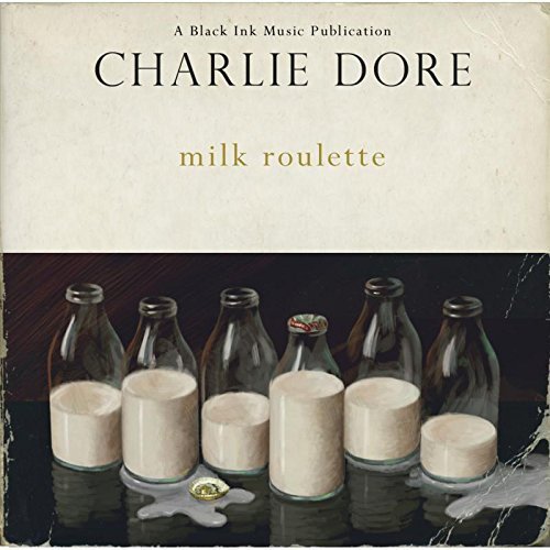 CD cover for Charlie Dore’s “Milk Roulette” featuring milk bottles and glasses.