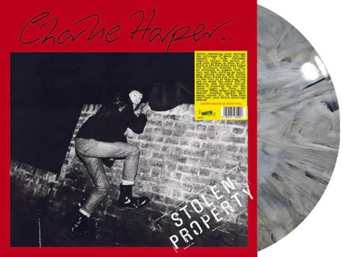 Vinyl record cover featuring a person in silhouette and marbled vinyl disc.