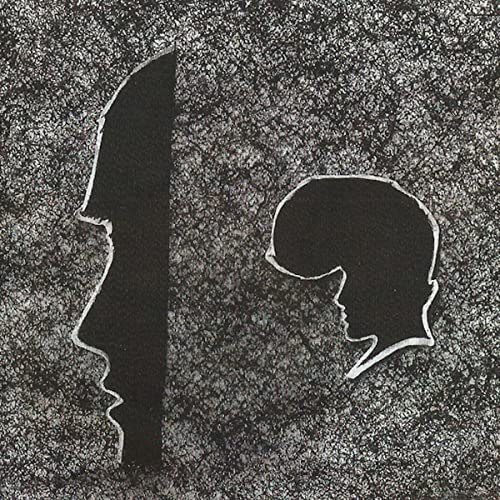 Black and white album cover with silhouettes of a profile and a pompadour hairstyle.
