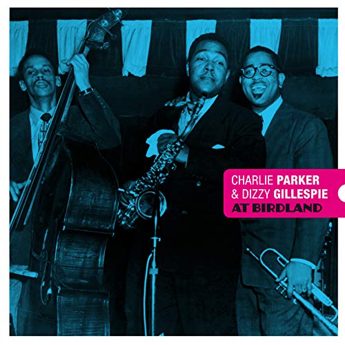 Charlie Parker, Dizzy Gillespie, and a bassist with their instruments.