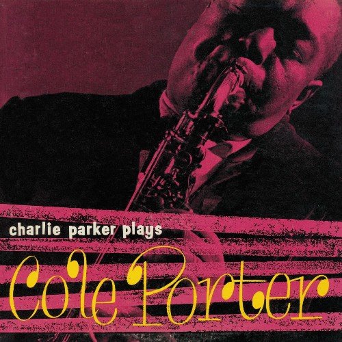 "Album cover with Charlie Parker playing saxophone, red-toned image, yellow and white text."