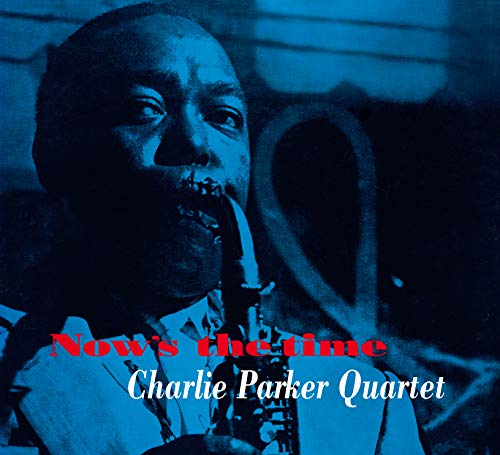 "Blue-toned album cover with Charlie Parker holding a saxophone, text overlay."