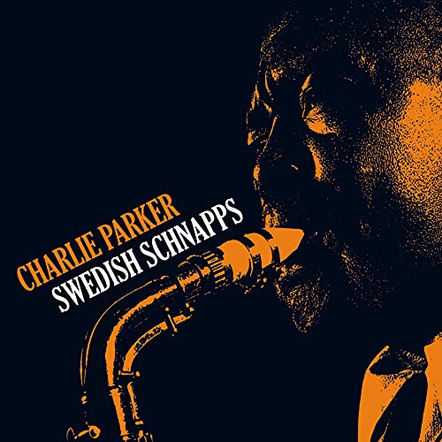 Charlie Parker portrait playing saxophone, album cover in orange and black.