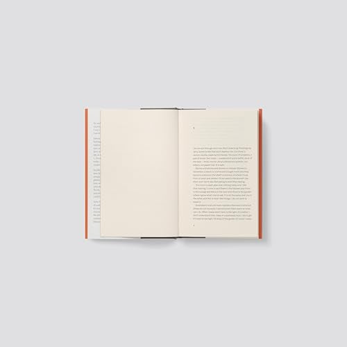 An open book showing a blank left page and text on the right page.