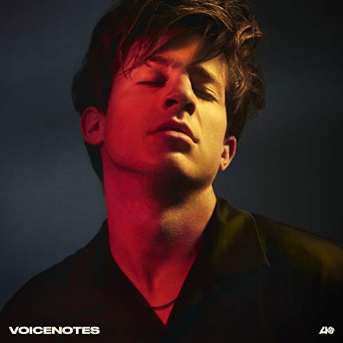 Charlie Puth album cover, "Voicenotes," featuring a close-up portrait.