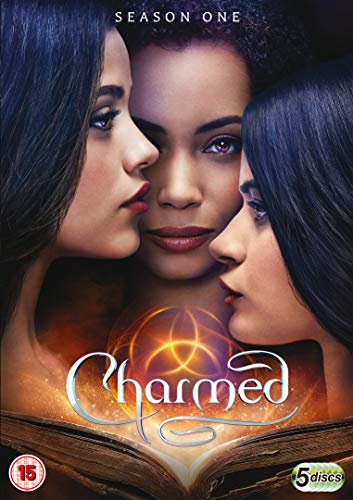 DVD cover for "Charmed" featuring three women and a glowing symbol.