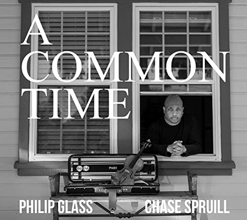 CD case featuring composer Philip Glass, likely with minimalist album art.