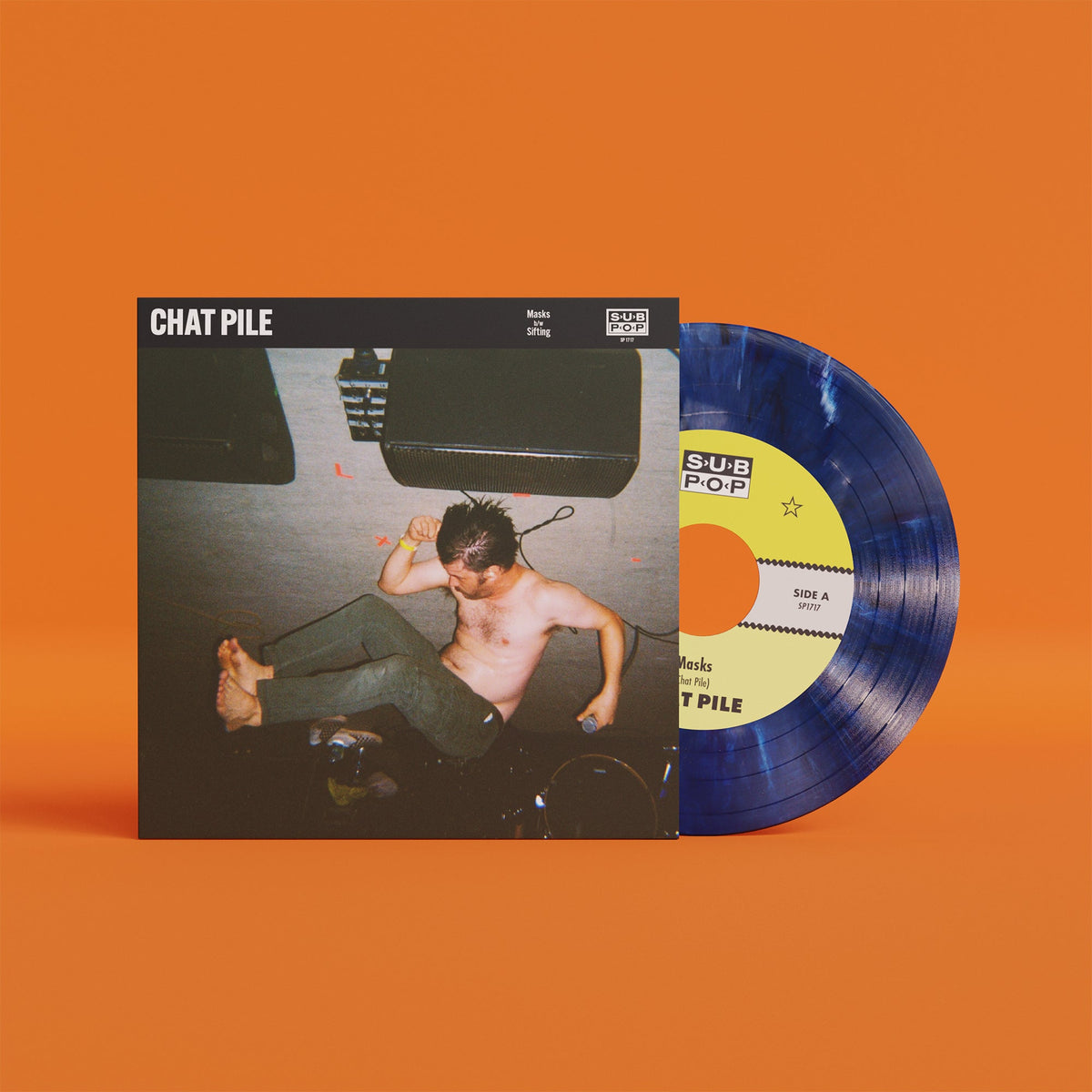Chat Pile "Masks" vinyl record with blue marble effect, album cover shown.