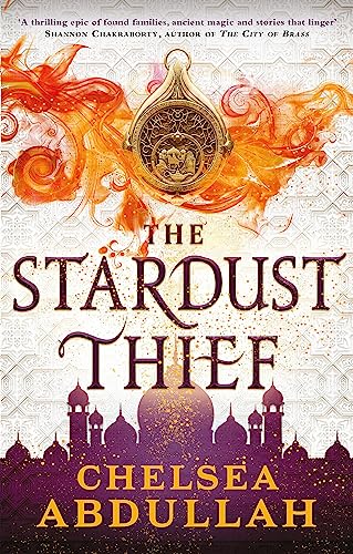 Book cover: “The Stardust Thief” with ornate gold design and silhouetted city.