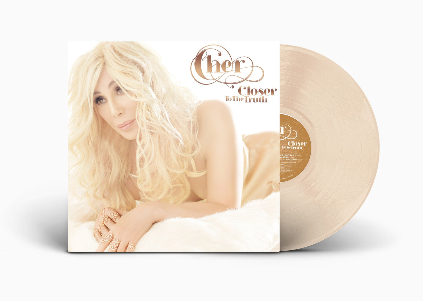Cher album cover and tan vinyl record, side view.