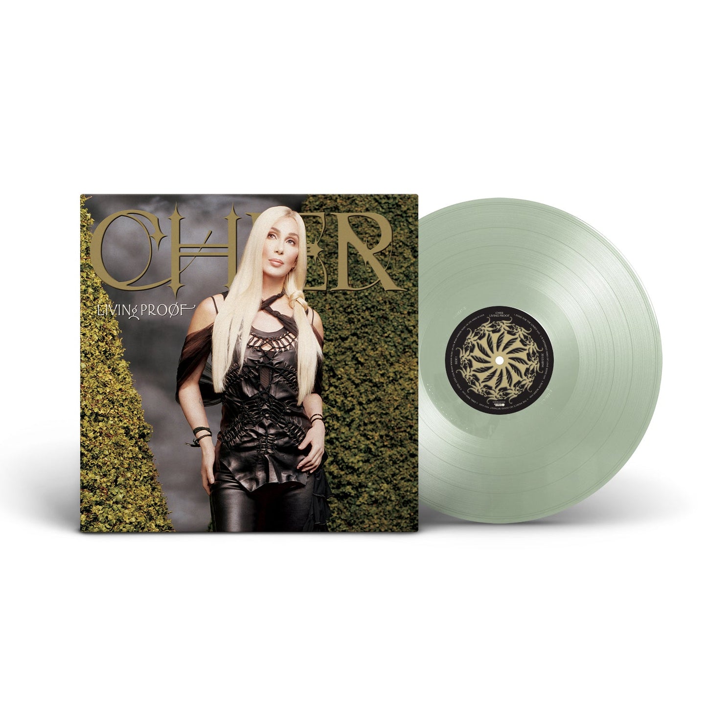 Cher Living Proof album cover next to a translucent light green vinyl record.