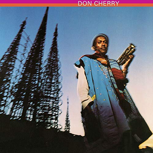 Don Cherry album cover featuring a musician with a trumpet, tall trees.