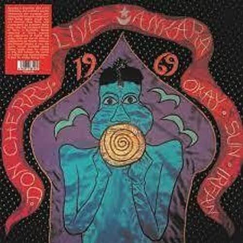 Vinyl record cover with psychedelic illustration of a blue figure.