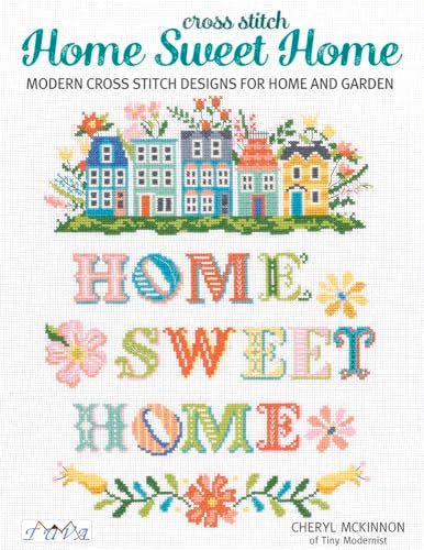 Cross stitch book cover featuring colorful embroidered houses and lettering.