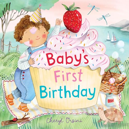 Child beside a large strawberry cupcake with “Baby’s First Birthday” text.