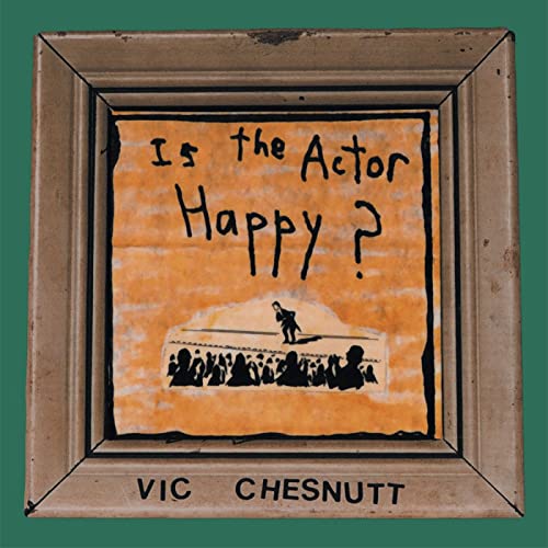 Vinyl record cover: orange background with handwritten text and silhouetted figures.