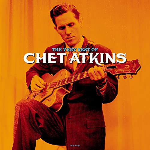 Chet Atkins playing a guitar on the album cover, orange background.
