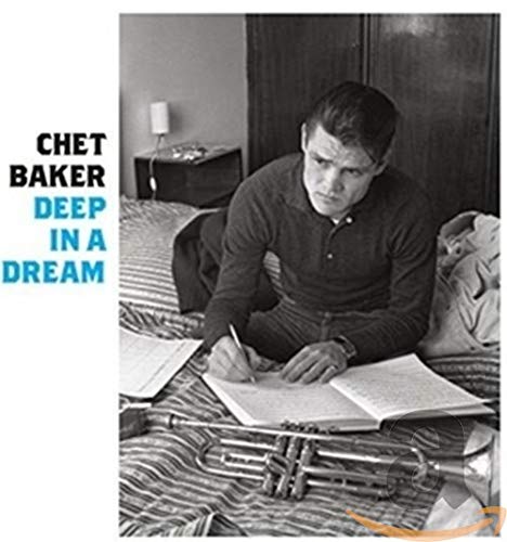 Chet Baker album cover: musician writing in bed with trumpet nearby.