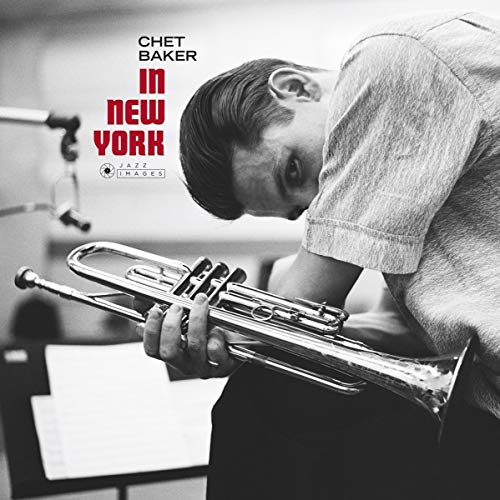 Black and white photo of Chet Baker holding a trumpet, with album title text.