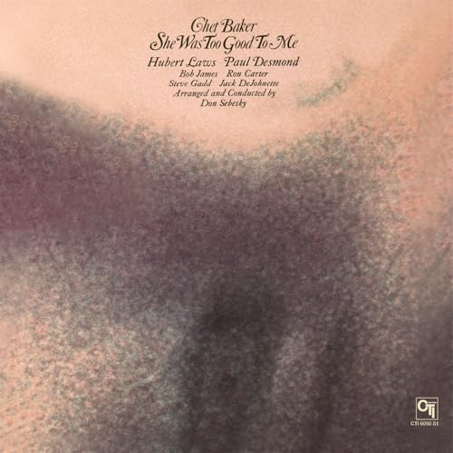 Chet Baker album cover, textured brown background, with white text.