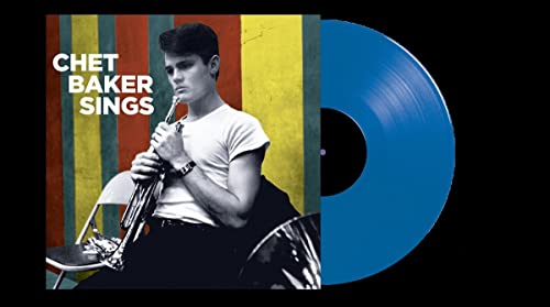 Chet Baker album cover and blue vinyl record against black background.