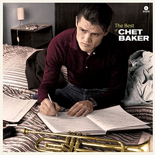 Chet Baker album cover: man writing music with a trumpet nearby.