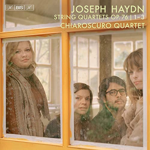 CD cover featuring four musicians viewed through window panes.