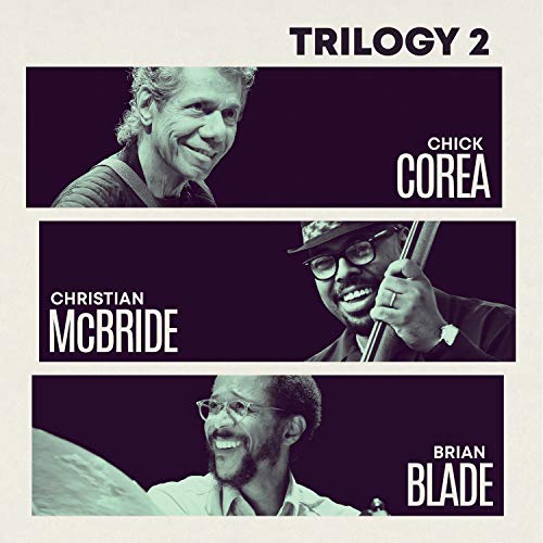 "Album cover with three monochrome musician portraits and 'Trilogy 2' title."