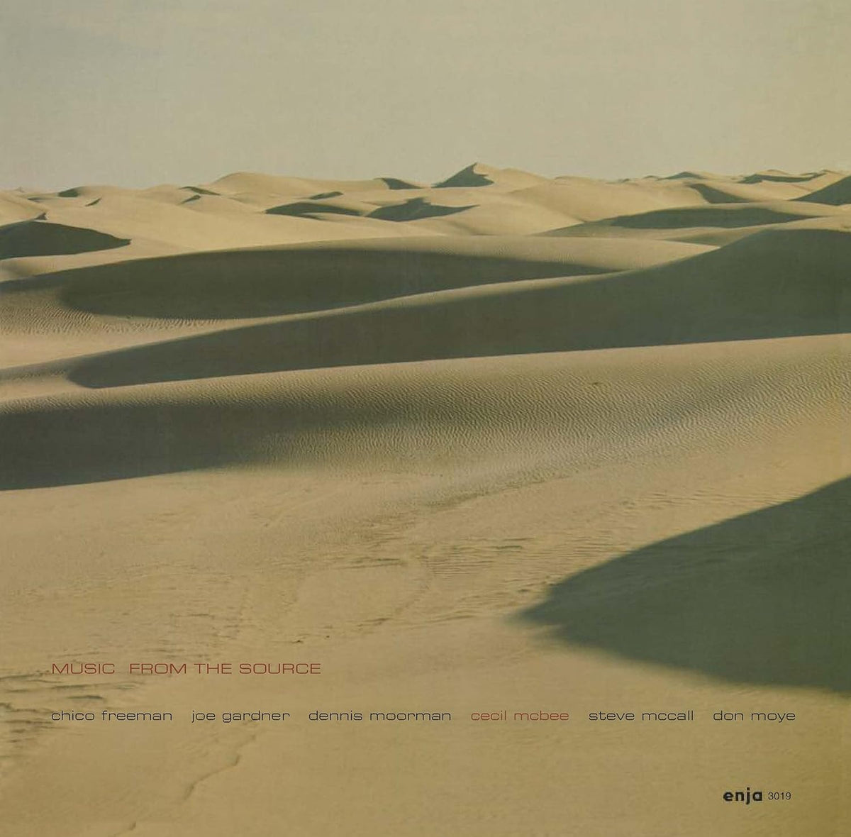 Vinyl record cover: desert landscape with text listing artist and musicians.