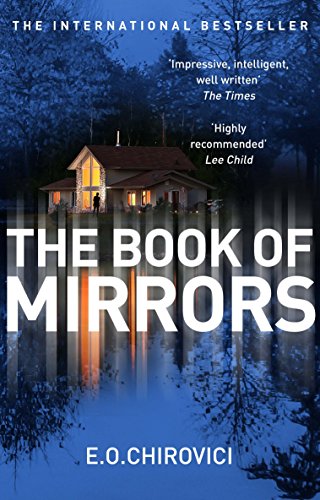 Book cover: lakeside house illuminated at night, titled “The Book of Mirrors”.