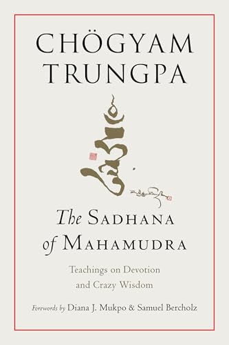 Buddhist book with Tibetan cover, featuring a serene image or symbolic illustration within.