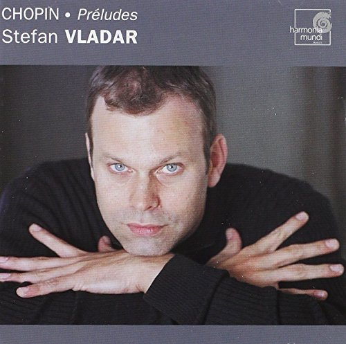 CD cover featuring pianist Stefan Vladar in a dark sweater.