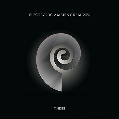 CD cover: dark background with a silver spiral and text "THREE".