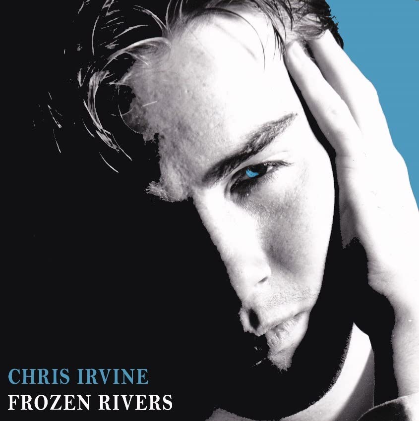 Close-up of Chris Irvine with one blue eye, album cover art.