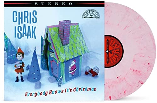 Chris Isaak Christmas vinyl record with colorful gingerbread house cover art.