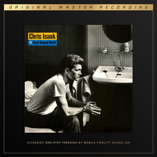 Chris Isaak album cover: black and white photo of a man in a bathroom.