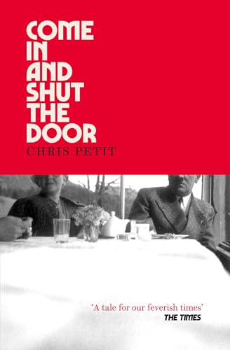 Book cover: red background, white text, and a black and white family photo.