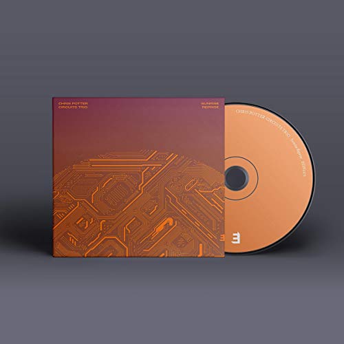 "CD case with orange circuit design and matching CD partially visible, on gray background."