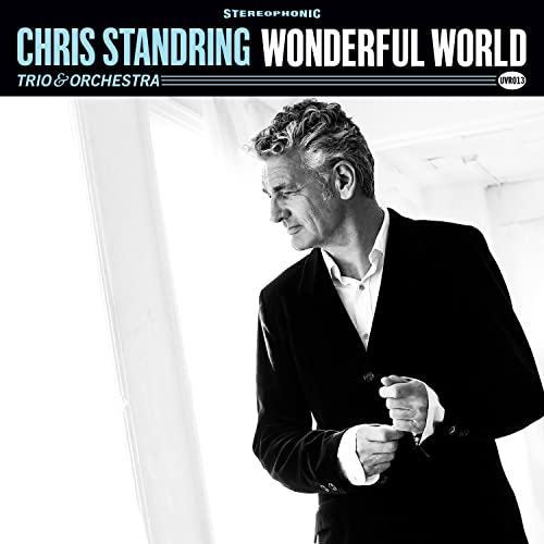 CD cover: Chris Standring in suit, black and white portrait.