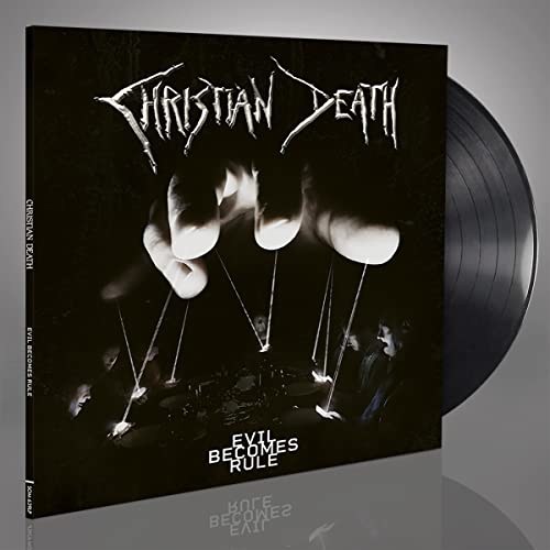 Christian Death album "Evil Becomes Rule" vinyl record with skeletal hand imagery.