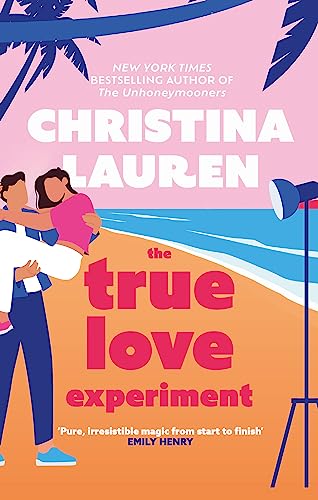 Book cover showing a man carrying a woman on a beach with a camera.