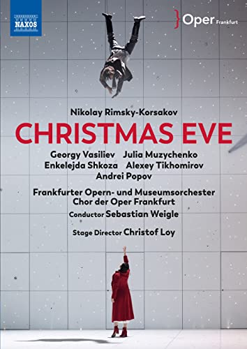 DVD cover for Christmas Eve showing a person in red reaching toward a falling figure.