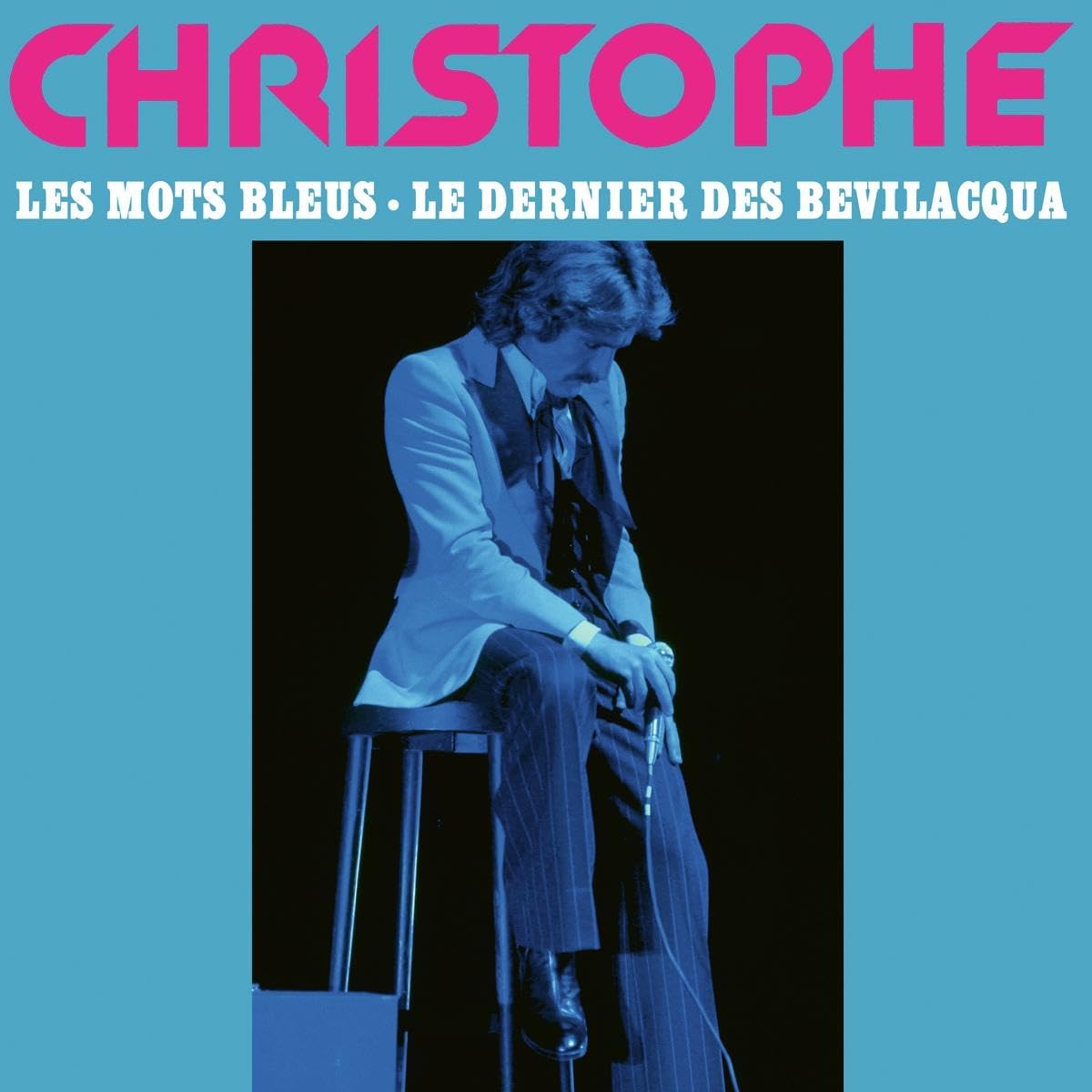 Christophe album cover: a portrait of the singer in a white suit.