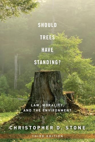 Book cover featuring a tree stump in a misty forest with white text overlay.