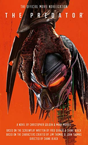 Book cover featuring a close-up of the Predator’s masked face and weaponry.