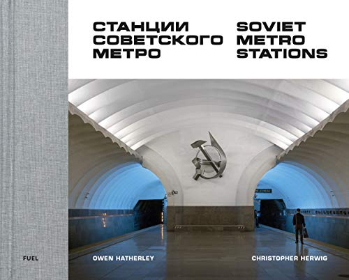 Photograph of ornate Soviet-era metro station with arches, columns, and decorative mosaics.