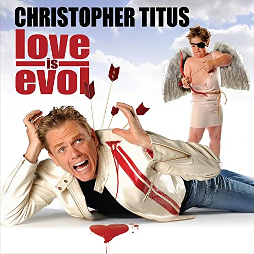Christopher Titus lying on the ground with arrows in his back, watched by Cupid.